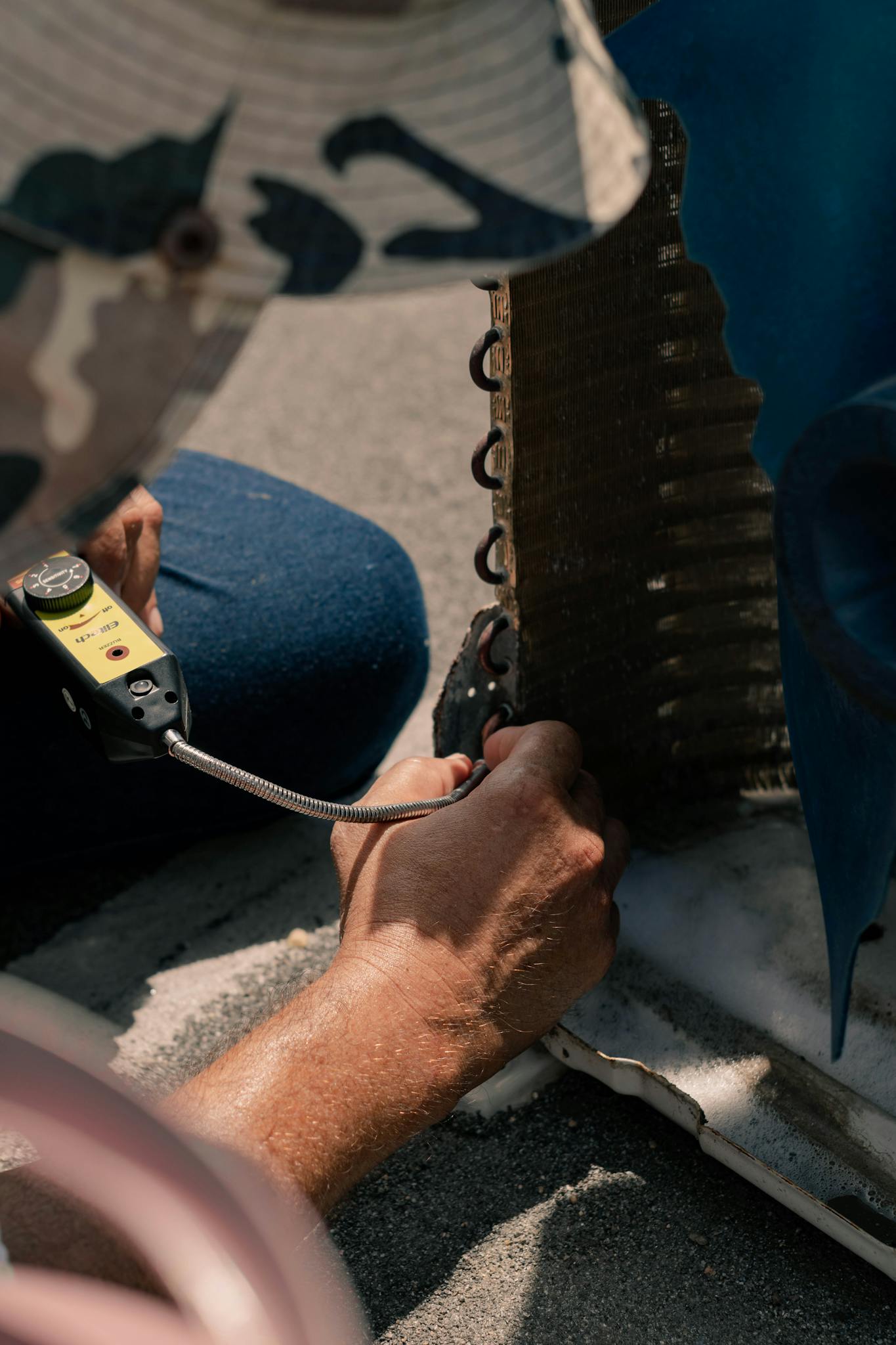 Man Repairing an Aircon